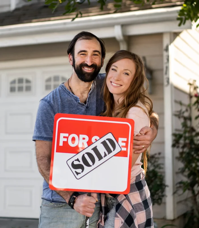 Happy couple selling their home with guidance and mortgage broker advice in Surrey